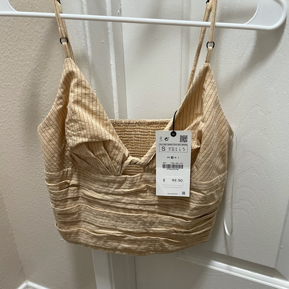 Tank top from Zara; size small. Never been worn with tag!
